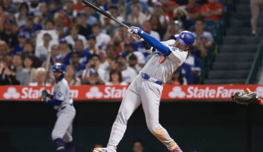 MLB player hitting during game representing player props and betting markets on DraftKings