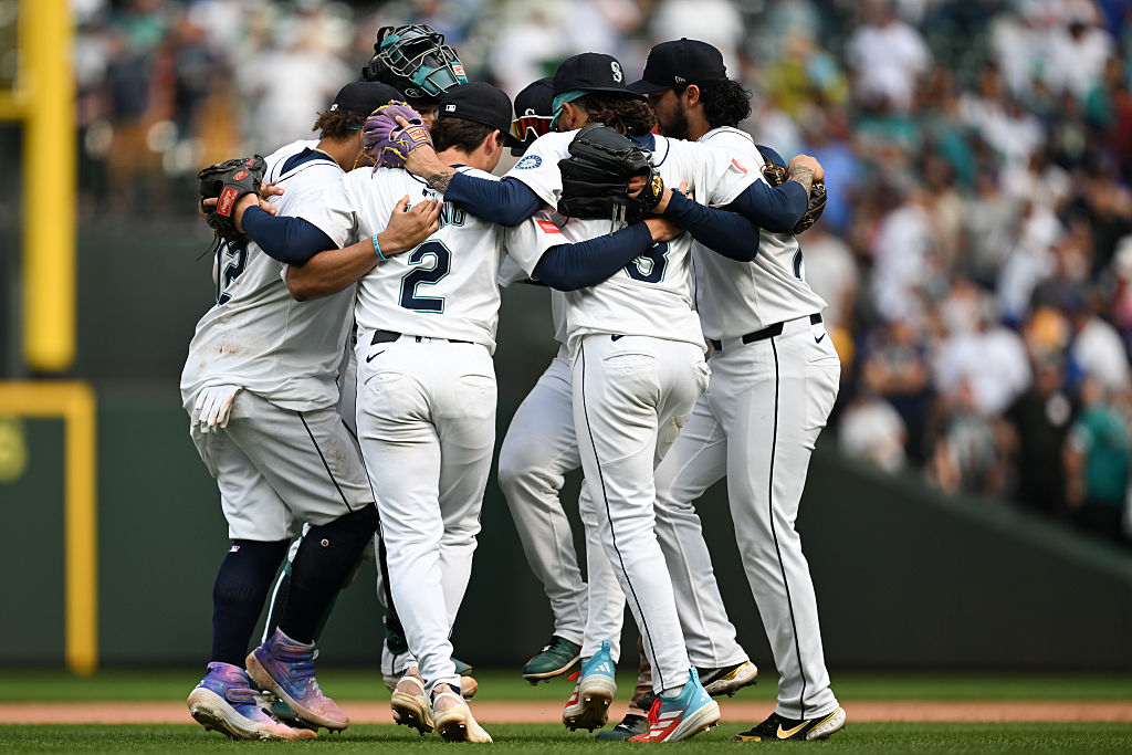SEATTLE, WA - AUGUST 27: Members of the Seattle Mariners celebrate after winning the game between the San Diego Padres and the Seattle Mariners at T-Mobile Park on Wednesday, August 27, 2025 in Seattle, Washington.