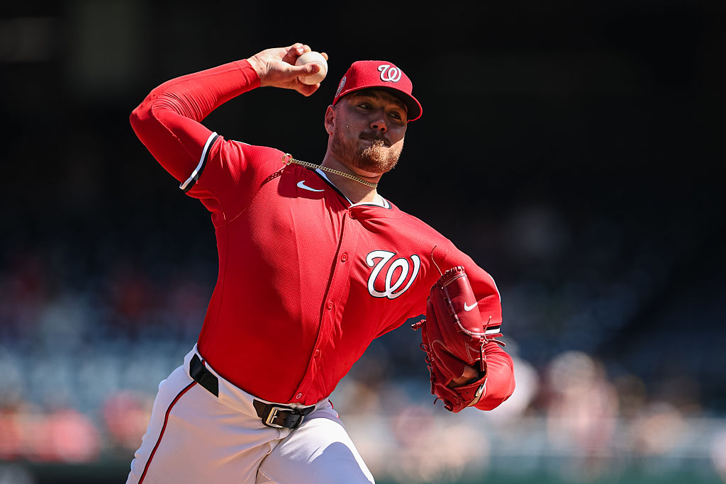 WASHINGTON, DC - SEPTEMBER 14: Cade Cavalli #24 of the Washington Nationals pitches against the Pittsburgh Pirates at Nationals Park on September 14, 2025 in Washington, DC.