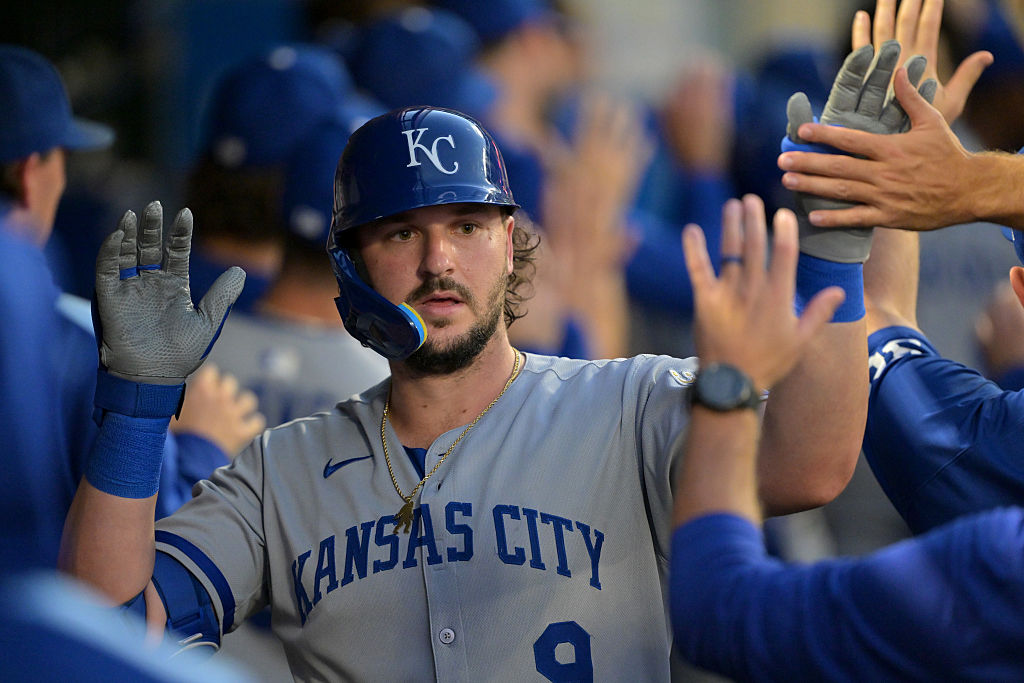 ANAHEIM, CALIFORNIA - SEPTEMBER 25: Vinnie Pasquantino #9 of the Kansas City Royals is congratulated in the dugout after hitting a two-run home run in the first inning against the Los Angeles Angels at Angel Stadium of Anaheim on September 25, 2025 in Anaheim, California.