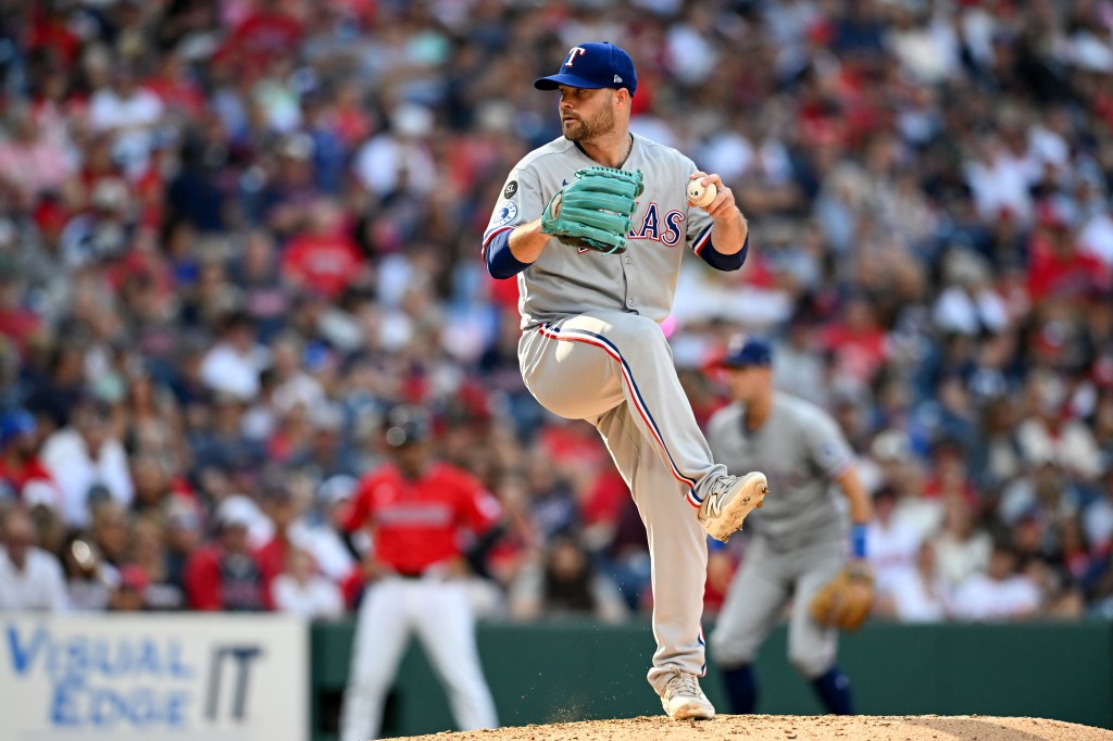 Danny Coulombe #54 of the Texas Rangers throws a pitch during the fifth inning against the Cleveland Guardians at Progressive Field on September 28, 2025 in Cleveland,