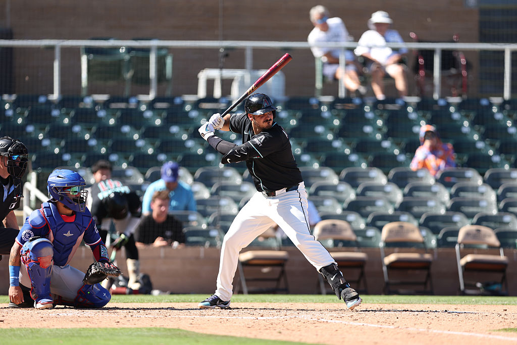 SCOTTSDALE, ARIZONA - MARCH 21: Nolan Arenado #28 of the Arizona Diamondbacks bats during the sixth...