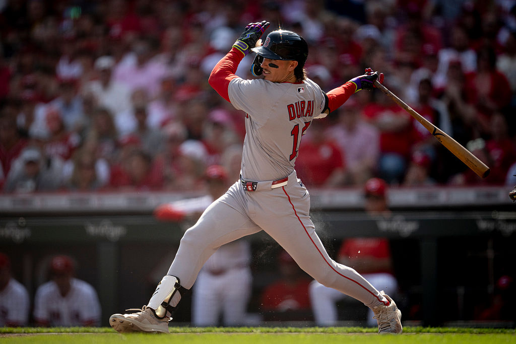 CINCINNATI, OHIO - MARCH 26: Jarren Duran #16 of the Boston Red Sox hits a single during the first inning of the Opening Day game against the Cincinnati Reds on March 26, 2026 at Great American Ball Park in Cincinnati, Ohio. (Photo by Maddie Malhotra/Boston Red Sox/Getty Images)
