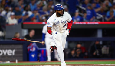 TORONTO, CANADA - MARCH 27: Vladimir Guerrero Jr. #27 of the Toronto Blue Jays throws the bat as he singles in the fourth inning of their MLB game against the Athletics at Rogers Centre on March 27, 2026 in Toronto, Ontario, Canada. (Photo by Cole Burston/Getty Images)