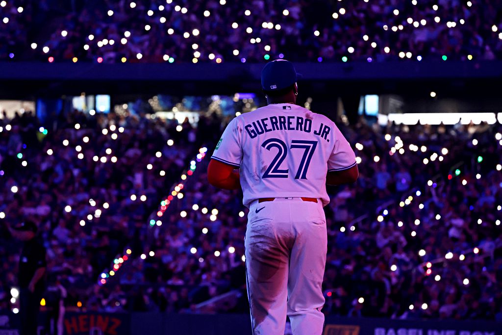 TORONTO, ON - March 27 - First baseman Vladimir Guerrero Jr. #27 of the Toronto Blue Jays takes the field for the ninth inning against the Athletics at the Rogers Centre in Toronto on Friday, March 27, 2026. The opening game marks the start of the 50th anniversary season for the Blue Jays. Steve Russell/Toronto Star March-27-2026 (Steve Russell/Toronto Star via Getty Images)
