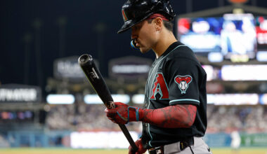 LOS ANGELES, CALIFORNIA - MARCH 28: Corbin Carroll #7 of the Arizona Diamondbacks walks to the on deck circle during a game against the Los Angeles Dodgers at Dodger Stadium on March 28, 2026 in Los Angeles, California. (Photo by Brandon Sloter/IOS/Getty Images)