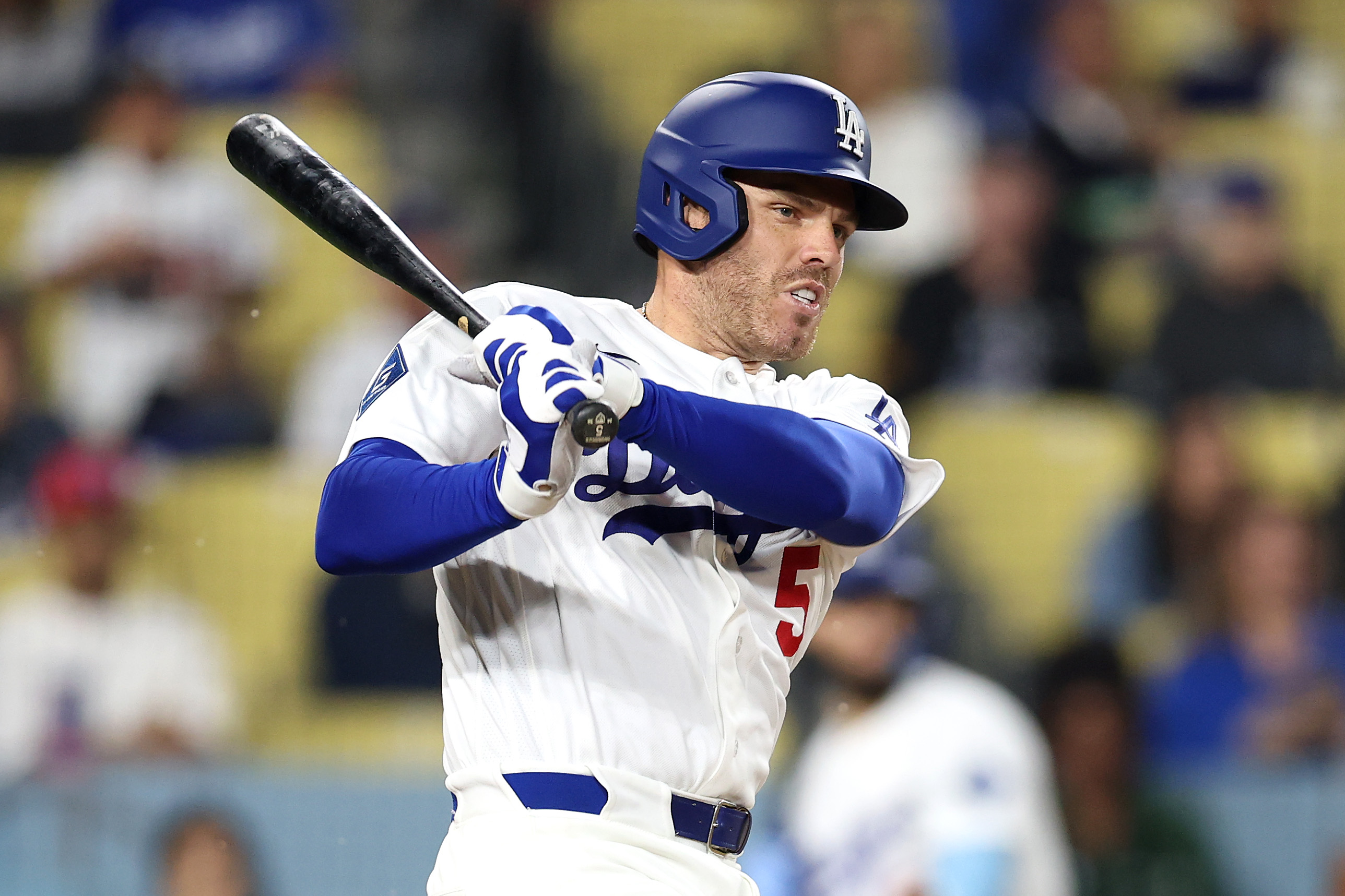 The Dodgers’ Freddie Freeman hits an RBI groundout during the...