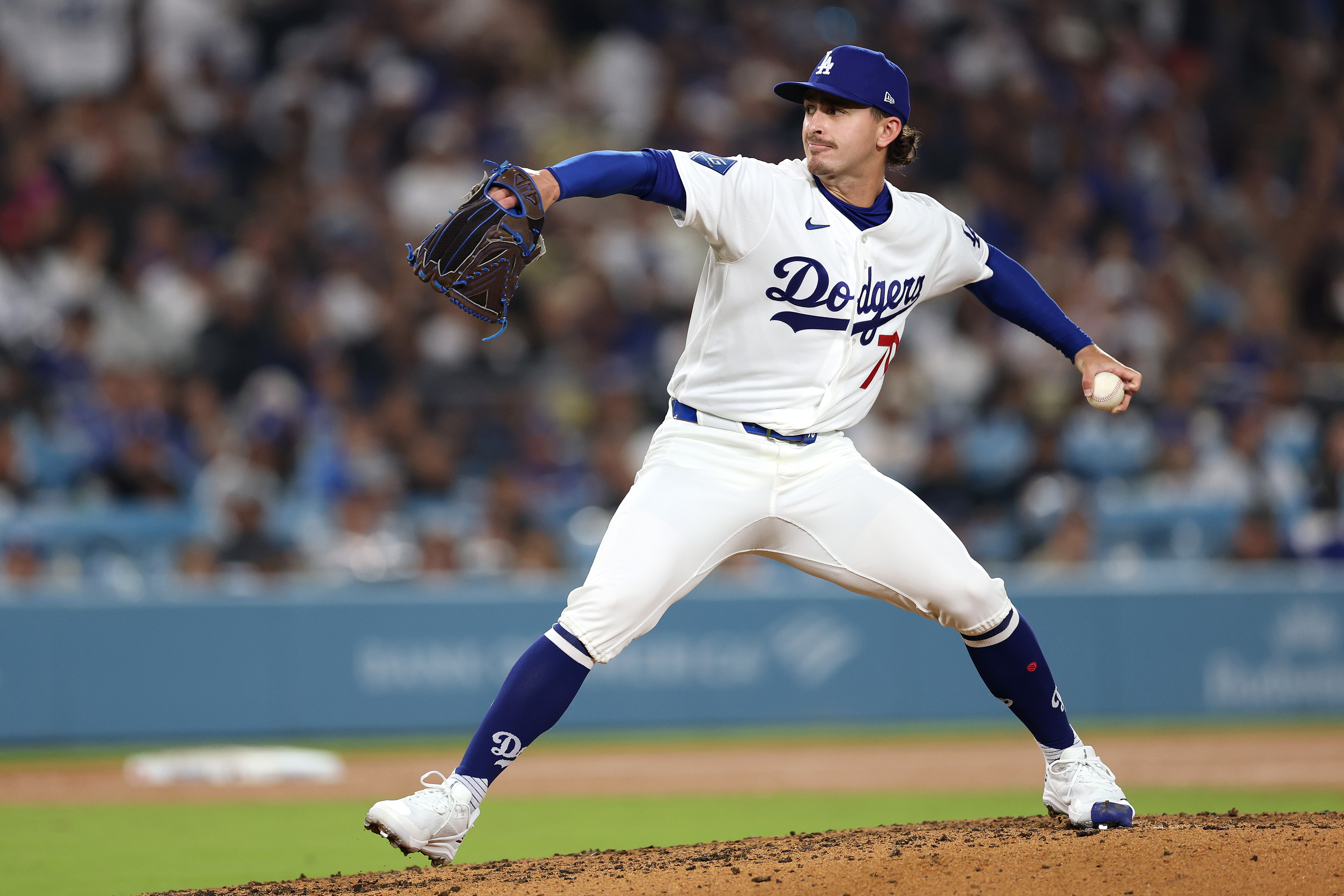 Dodgers relief pitcher Justin Wrobleski throws to the plate during...