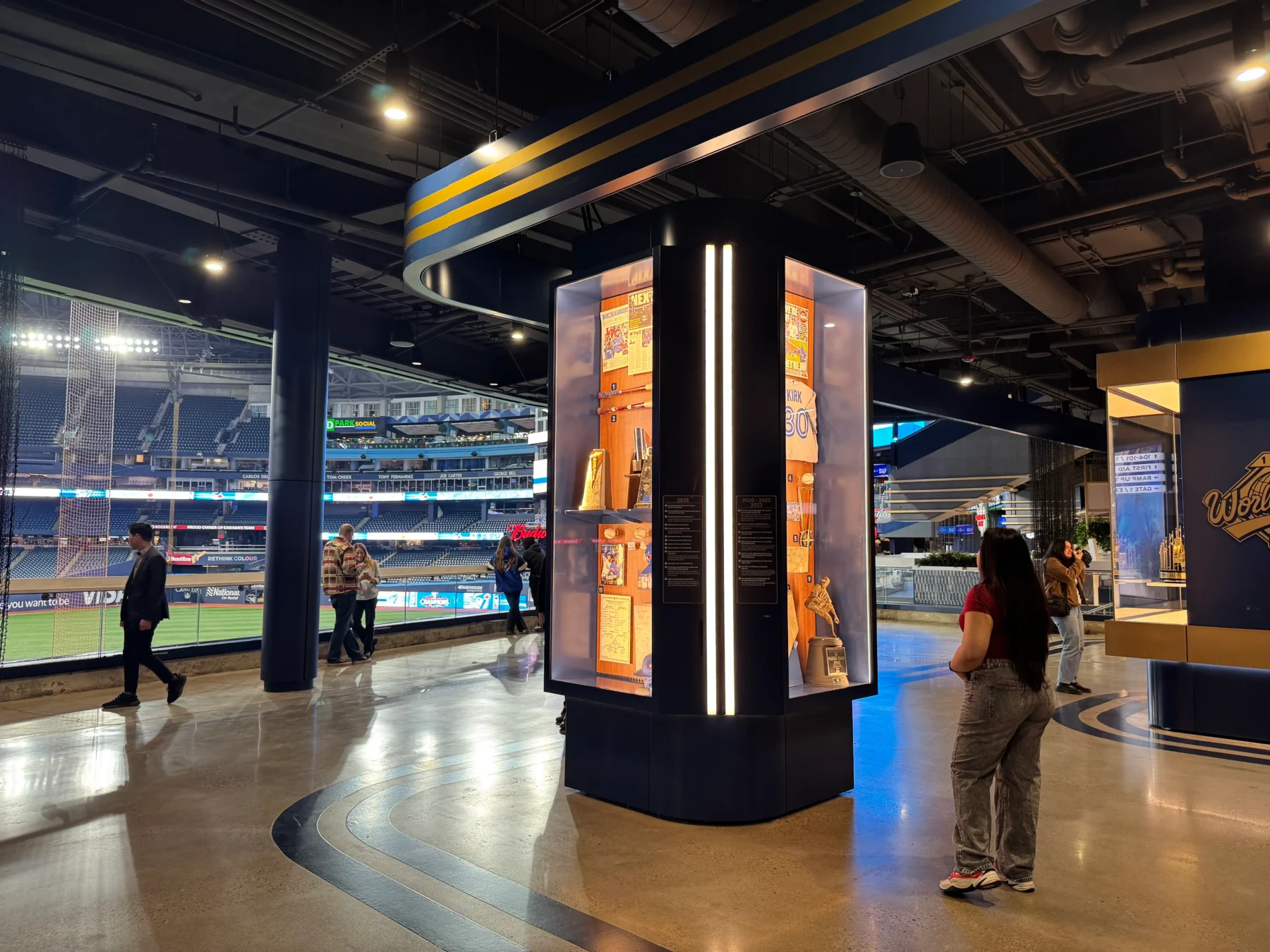 Modern concession stand inside Rogers Centre with digital displays, offering snacks and beverages for Toronto Blue Jays fans before the game.