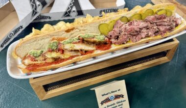 A 20-inch baguette sandwich and kettle chips from Chase Field.