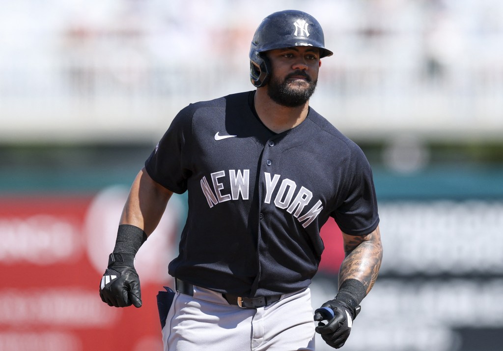 Yankees outfielder Jasson Dominguez rounds the bases after hitting a home run earlier in spring training.