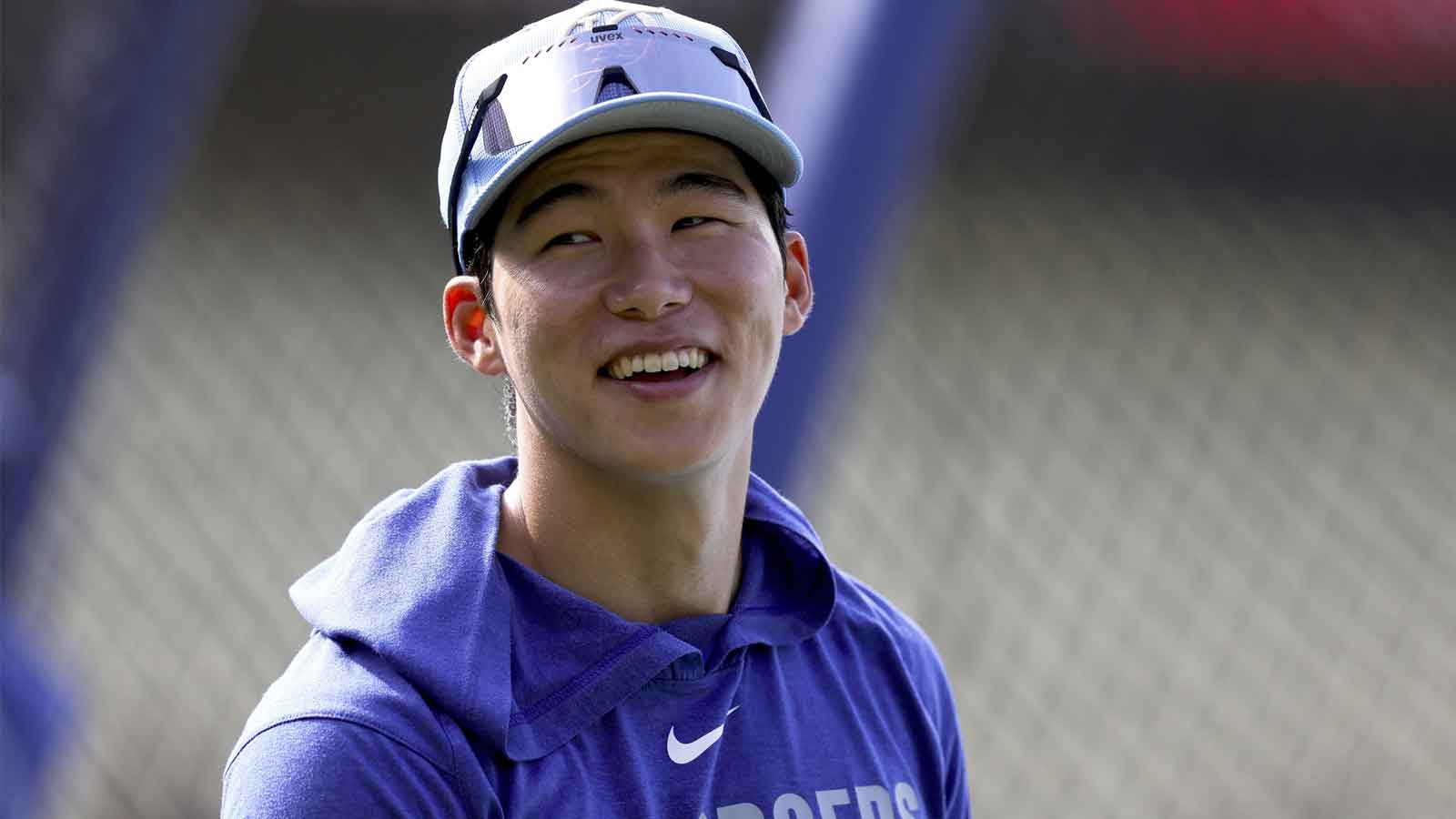  Los Angeles Dodgers second baseman Hyesong Kim smiles while taking batting practice before a baseball game against the San Francisco Giants at Dodger Stadium. Mandatory Credit: Ryan Sun-Imagn Images