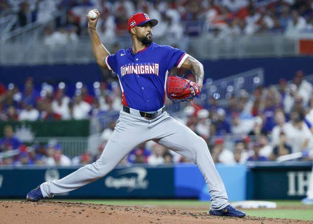 Dominican Republic pitcher Sandy Alcantara (7) pitches in the second inning against Venezuela during the World Baseball Classic at loanDept park on Wednesday, March 11, 2026. 