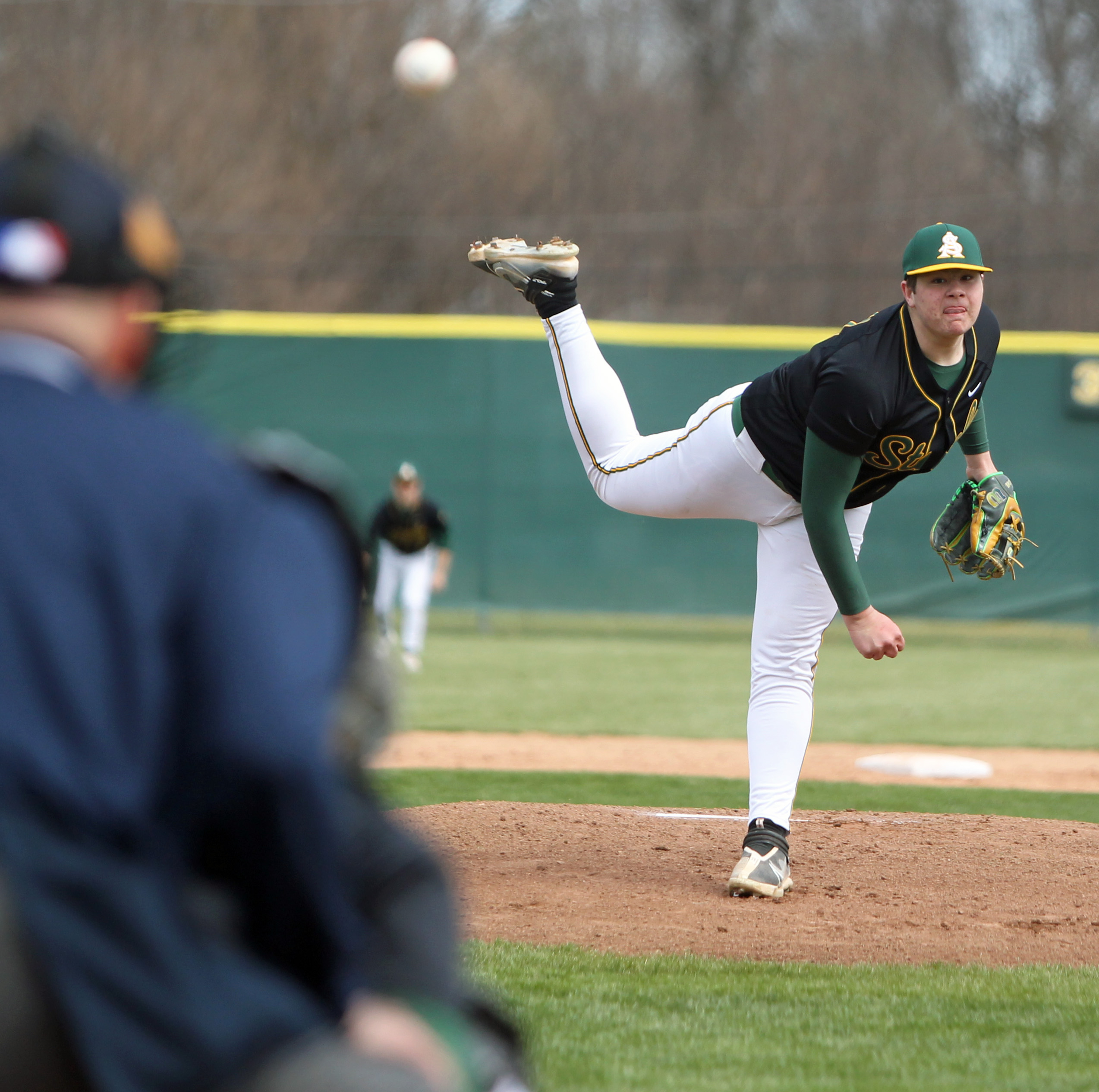 Brody Glick of Amherst delivers a first inng pitch against...
