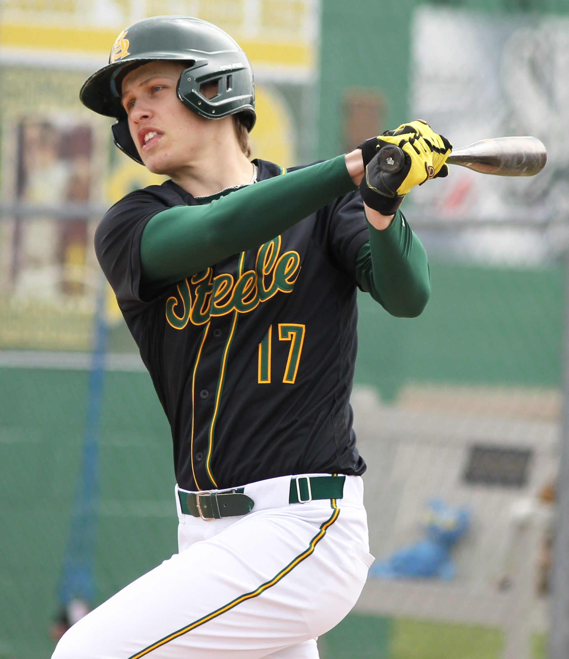 Harrison Schneider of Amherst doubles to left during the first...