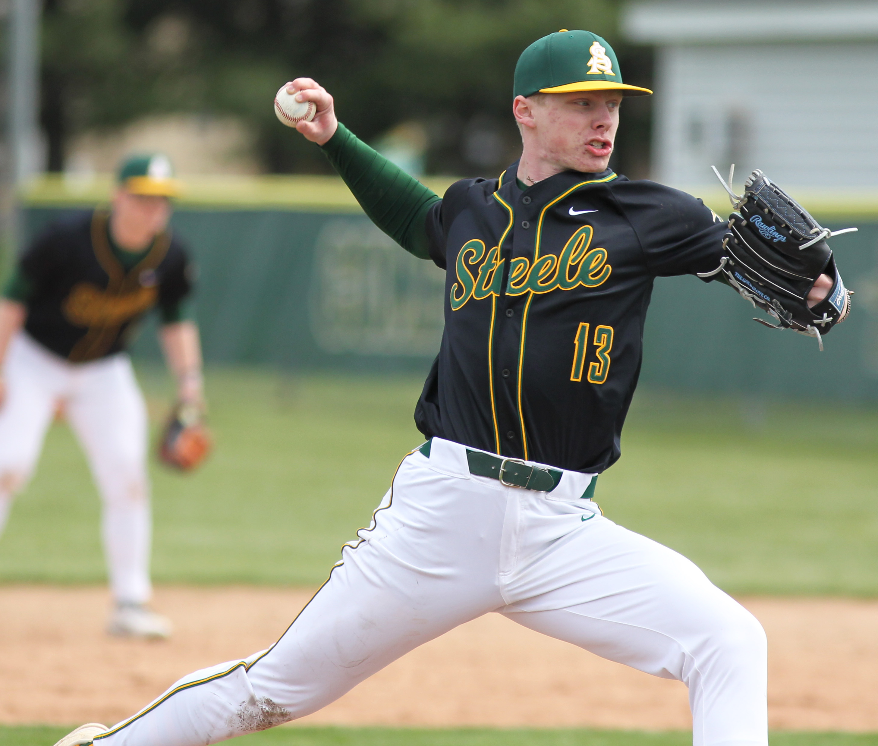 Spencer Cain of Amherst pitches in relief against Vermilion during...