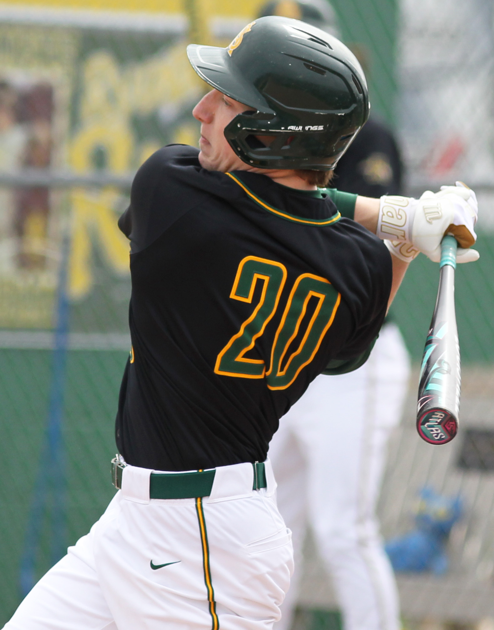Tyler Denn of Amherst fouls off a pitch against Vermilion...