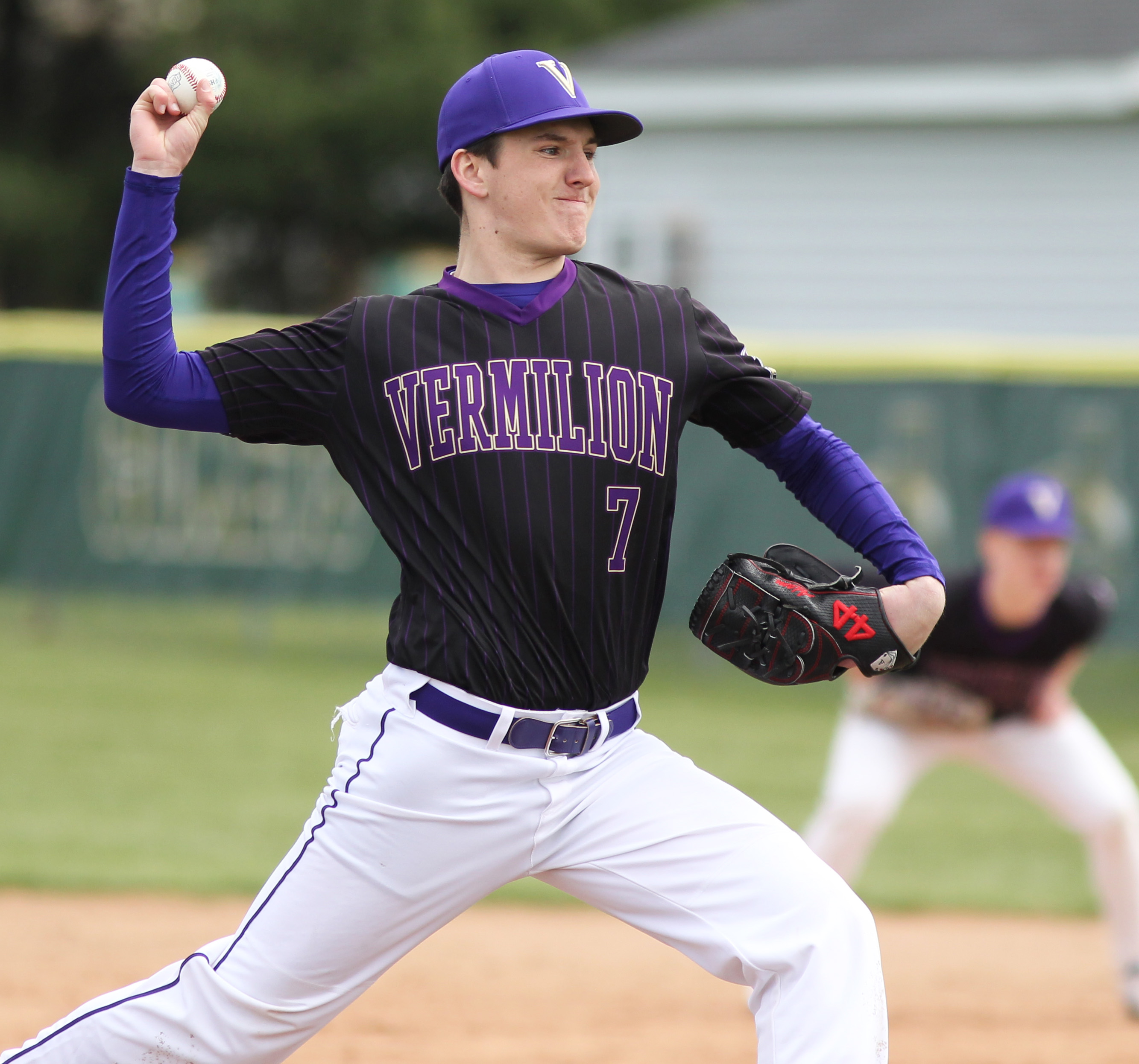 Vermilion's Adam Gerber delivers a first inning pitch against Amherst...