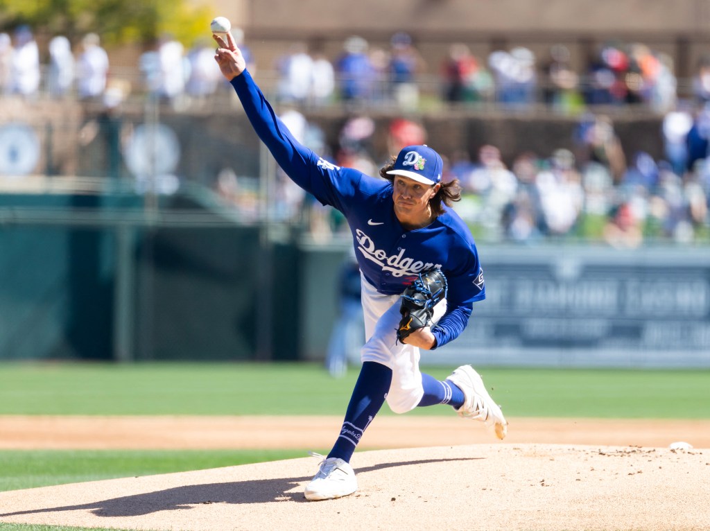 Los Angeles Dodgers pitcher Tyler Glasnow pitching during a spring training game.