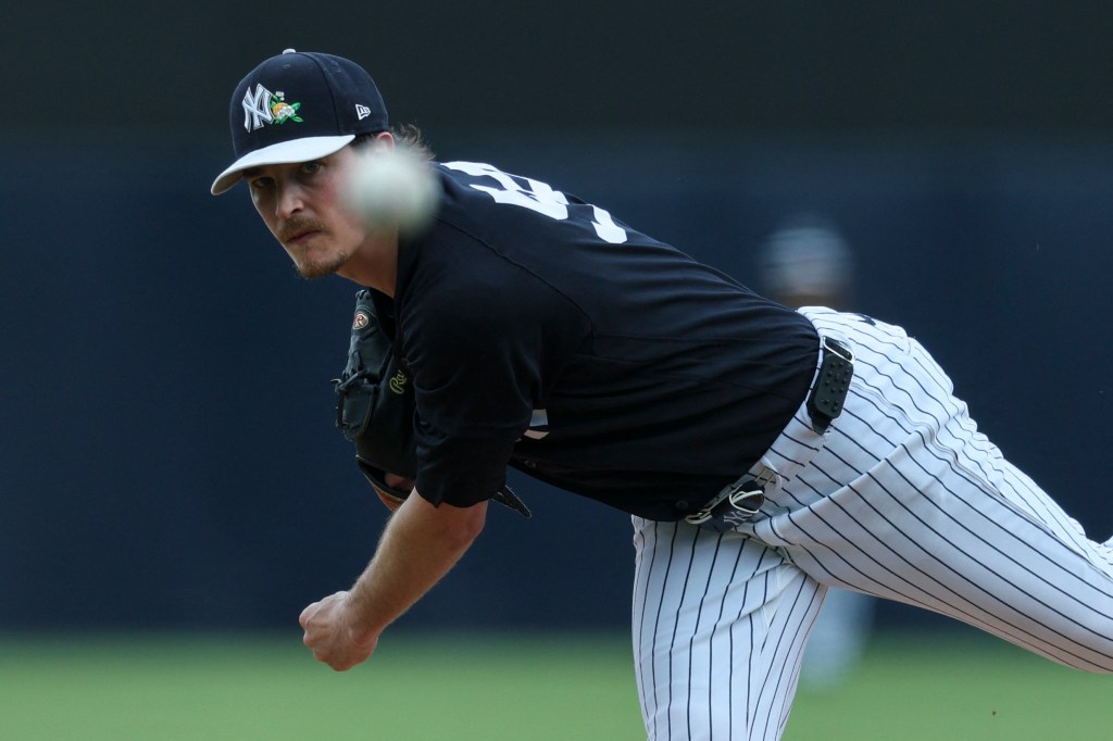 New York Yankees starting pitcher Max Fried (54) throws a pitch against the Philadelphia Phillies in the second inning during spring training at George M. Steinbrenner Field. 