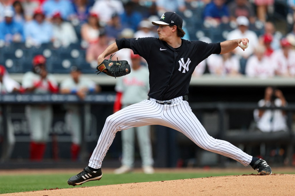 New York Yankees starting pitcher Max Fried (54) throws a pitch against the Philadelphia Phillies in the first inning during spring training at George M. Steinbrenner Field.