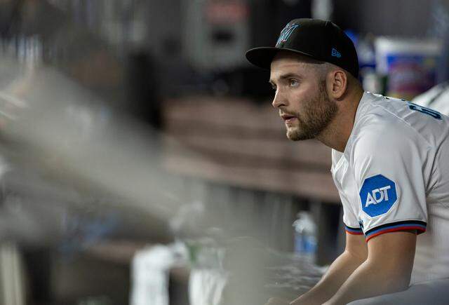 Miami Marlins relief pitcher Cade Gibson (58) looks on from the dugout after being subbed out in the seventh inning of his MLB game against the Minnesota Twins at loanDepot park on Thursday, July 3, 2025, in Miami, Fla.