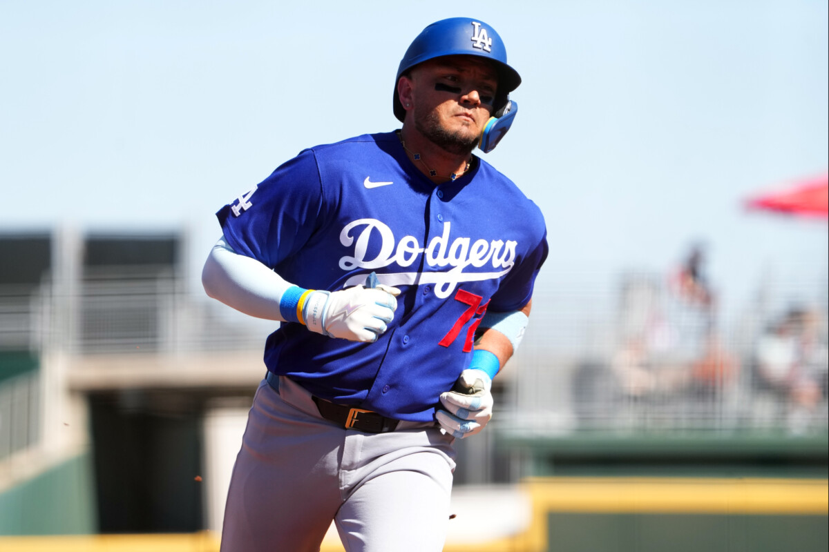 Los Angeles Dodgers designated hitter Miguel Rojas (72) runs the bases after hitting a two run home run against the Cleveland Guardians during the third inning at Goodyear Ballpark.
