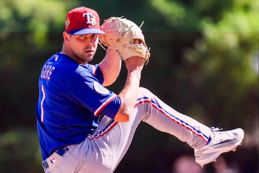 Texas Rangers pitcher MacKenzie Gore delivers during the first inning of a spring training...