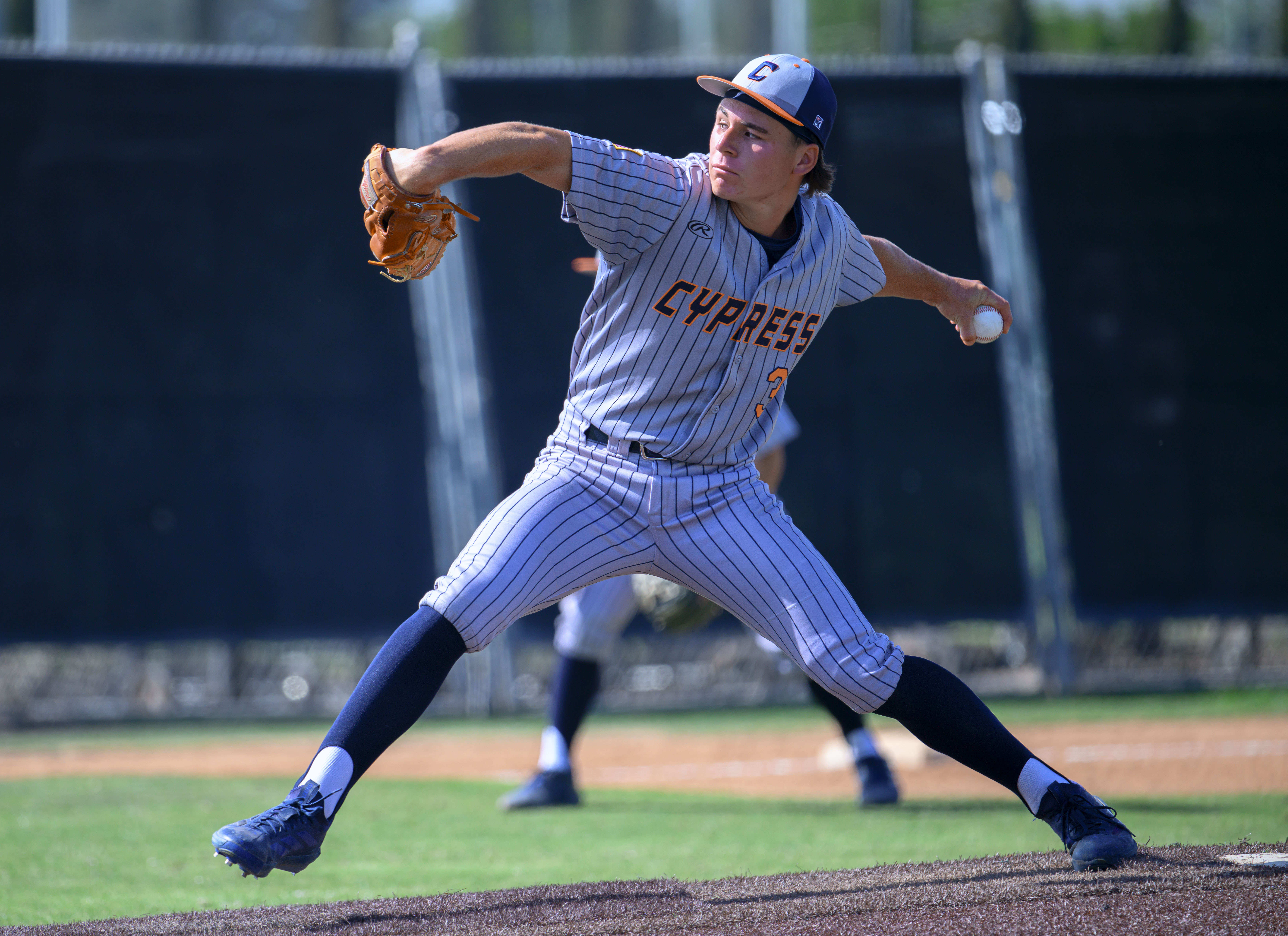 Cypress pitcher Tate Belfanti delivers a pitch against Foothill in...