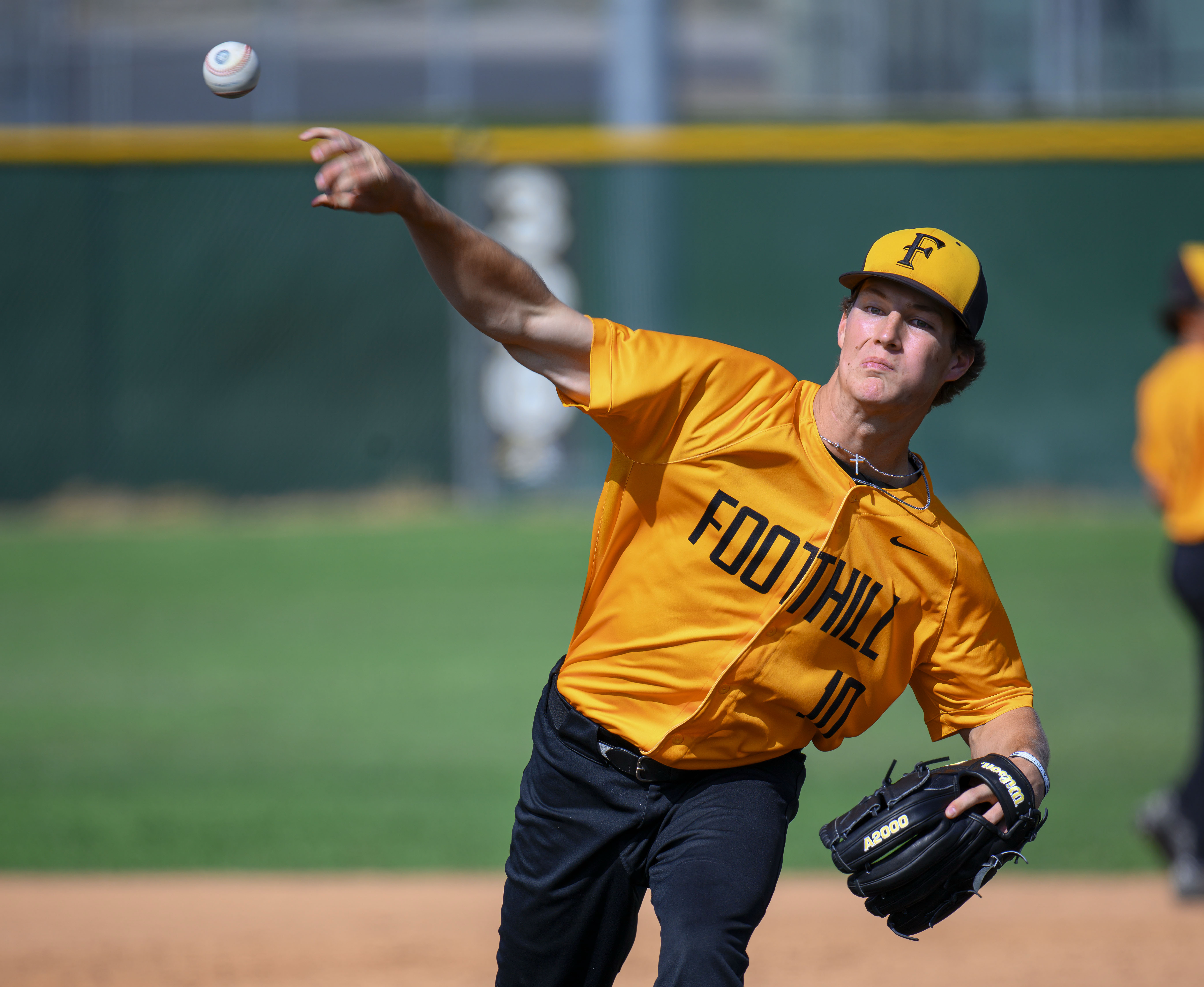 Foothill pitcher Caden Lauridsen delivers a pitch against Cypress in...