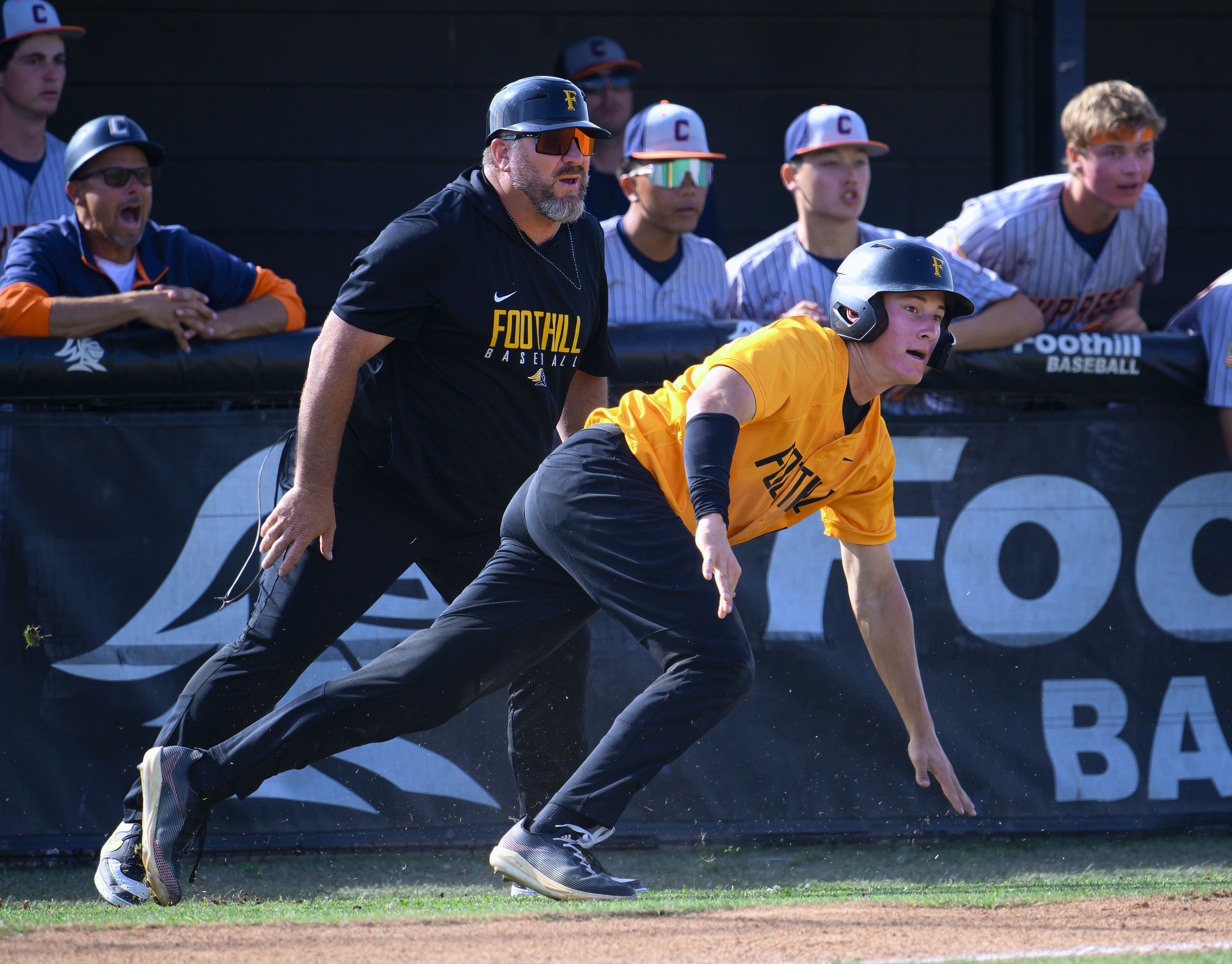 Foothill’s Jaxon Foshay scrambles to get back to the bag...