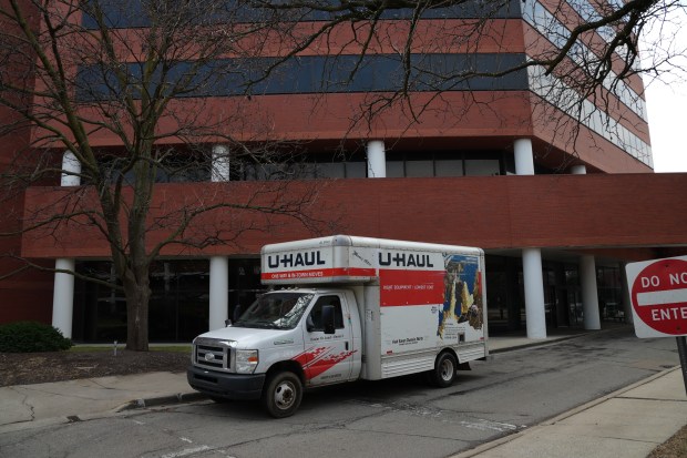 A U-Haul truck is parked outside of West Suburban Medical Center on Thursday, March 26, in Oak Park. (Cam'ron Hardy/Pioneer Press)