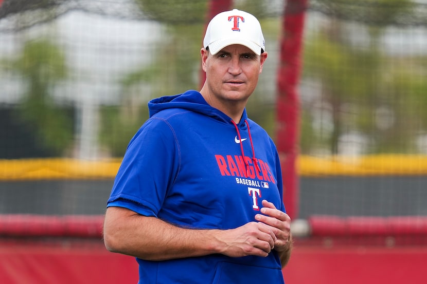 Texas Rangers president of baseball operations Chris Young looks on during a spring training...