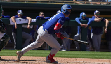 Los Angeles Dodgers left fielder Ryan Ward (67) hits an RBI double against the Athletics in the second inning at Hohokam Stadium.