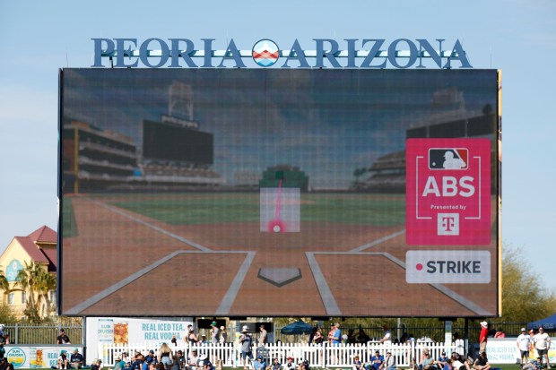 The scoreboard show the new ABS system during a protested call as the San Diego Padres played against the Seattle Mariners during a spring training game on Friday, Feb. 21, 2025. Major League Baseball is adopting the review system starting next season. (K.C. Alfred / The San Diego Union-Tribune)