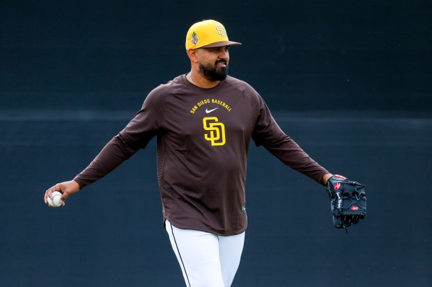 German Marquez #33 of the San Diego Padres participates in drills during spring training workouts at the Peoria Sports Complex on Monday, Feb. 16, 2026 in Peoria, Ariz.(Meg McLaughlin / The San Diego Union-Tribune)