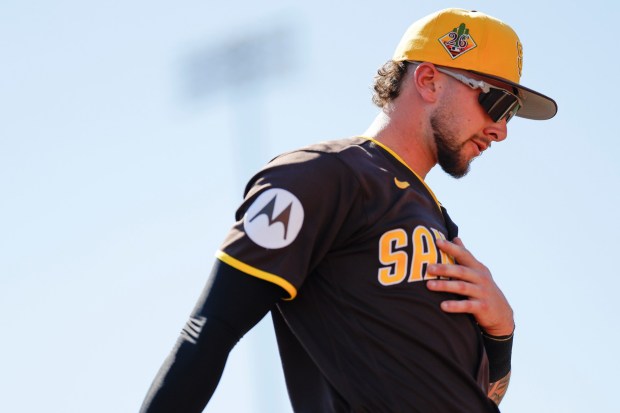 Padres center fielder Jackson Merrill walks towards the dugout during a spring training game against the White Sox at Camelback Ranch on Tuesday, March 3, 2026. (Meg McLaughlin / The San Diego Union-Tribune)
