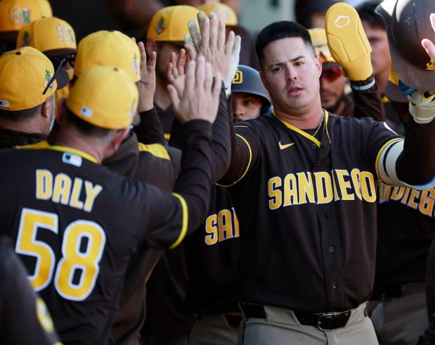Peoria, AZ - February 20: Jose Miranda #64 o the San Diego Padres celebrates a two-run home run against the Seattle Mariners during a spring training game on February 20, 2026 in Peoria, AZ. (K.C. Alfred / The San Diego Union-Tribune)