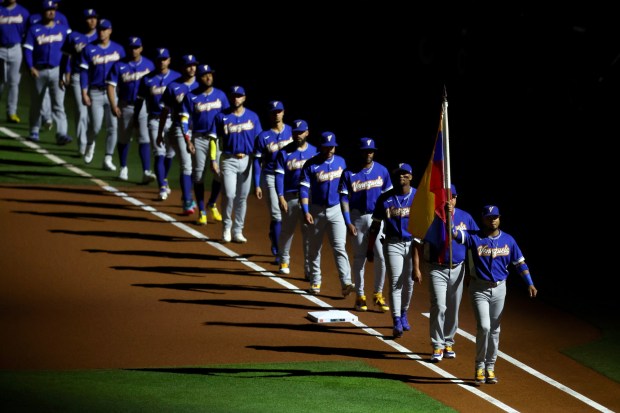 Luis Arraez #2 of Team Venezuela leads teammates onto the field before the game against Team United States at loanDepot park on March 17, 2026 in Miami, Florida. (Photo by Megan Briggs/Getty Images)