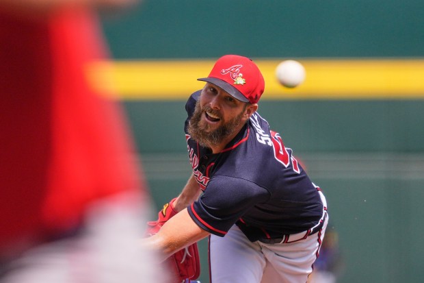 Atlanta Braves pitcher Chris Sale delivers in the first inning of a spring training baseball game against the Boston Red Sox in North Port, Fla., Friday, Feb. 27, 2026. (AP Photo/Gerald Herbert)