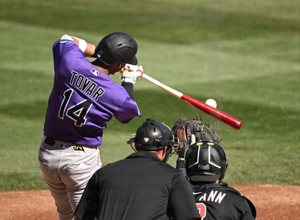 Colorado Rockies Infielder Ezequiel Tovar connects for a single during a spring training game agains the Arizona Diamondbacks at Salt River Field at Talking Stick in Scottsdale, Arizona on Feb. 21, 2026. (Photo by RJ Sangosti/The Denver Post)