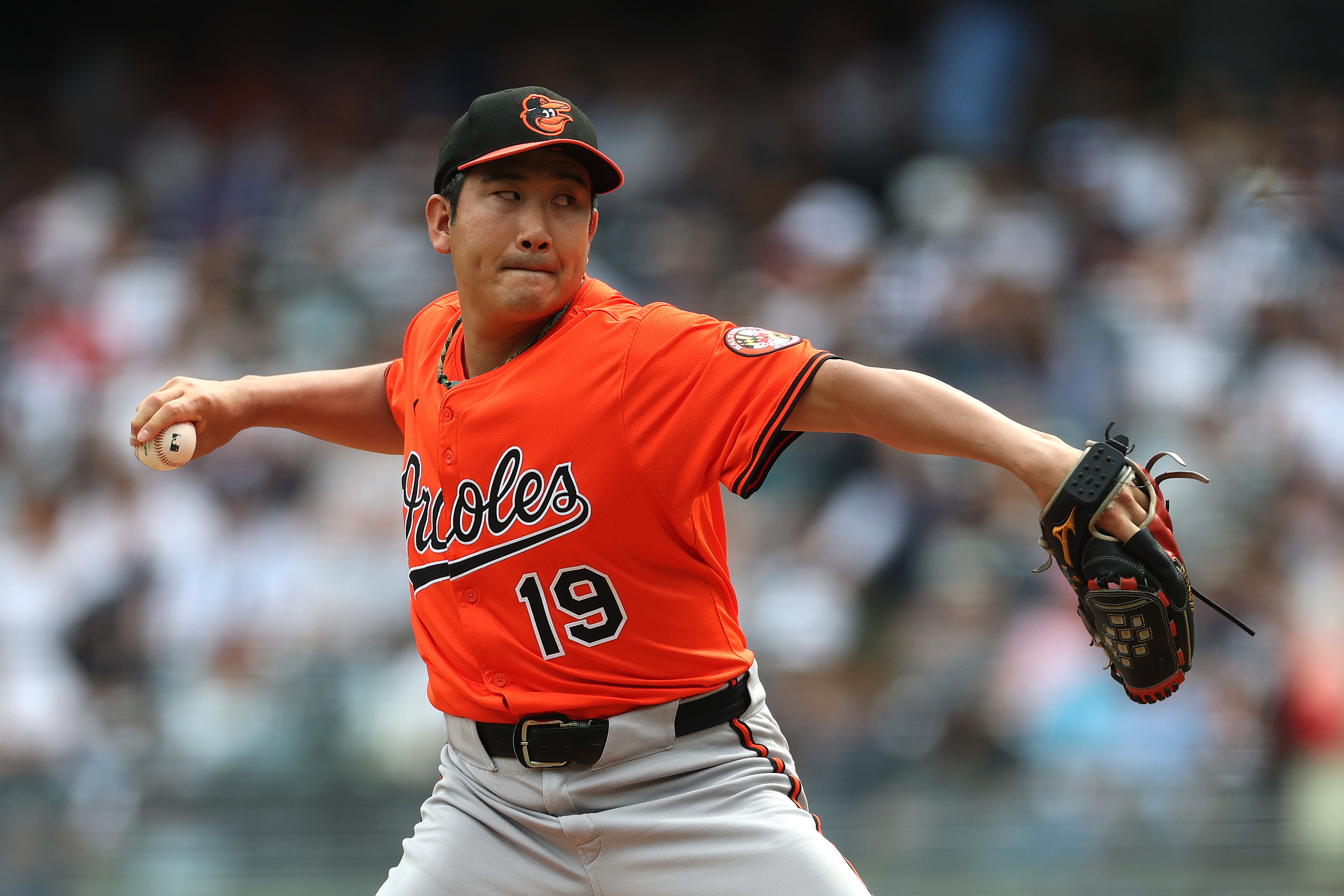 Tomoyuki Sugano of the Baltimore Orioles pitches against the New...