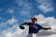Texas Rangers pitcher Cody Bradford throws in the bullpen during a spring training workout...