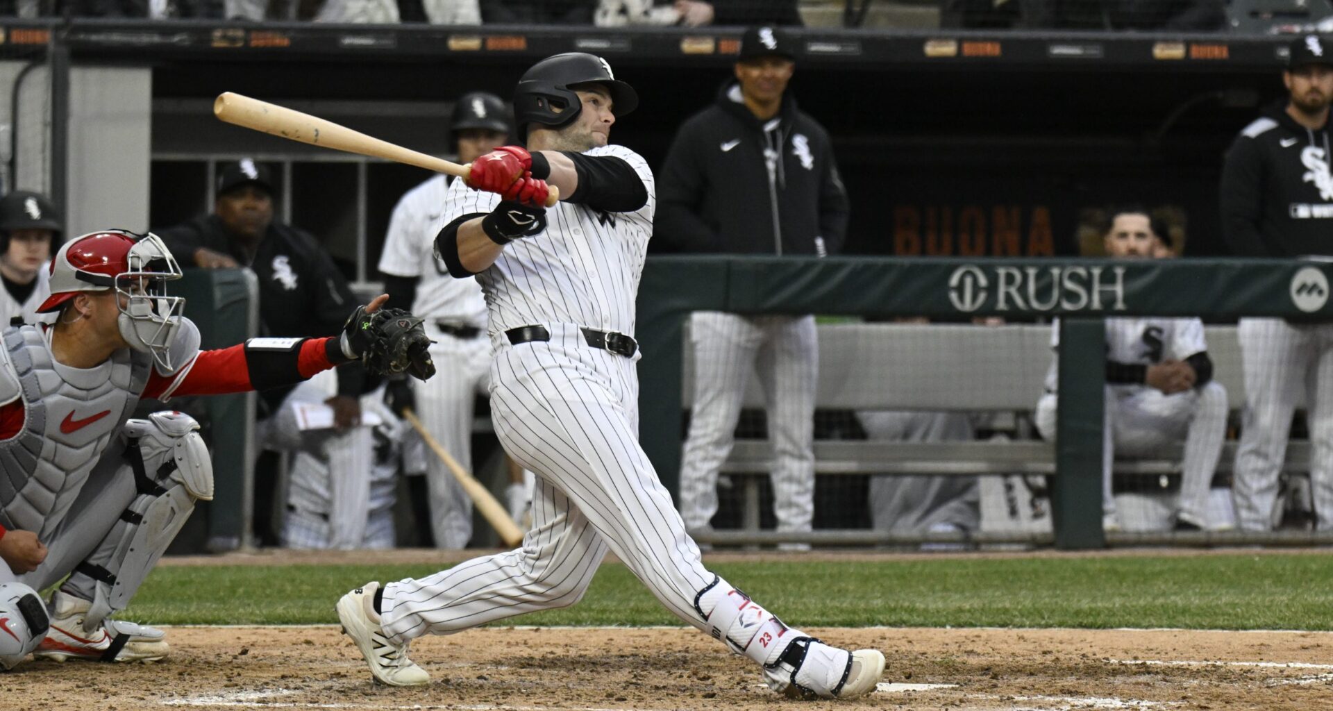 Chicago White Sox outfielder Andrew Benintendi (23) hits a three run home run against the Los Angeles Angels