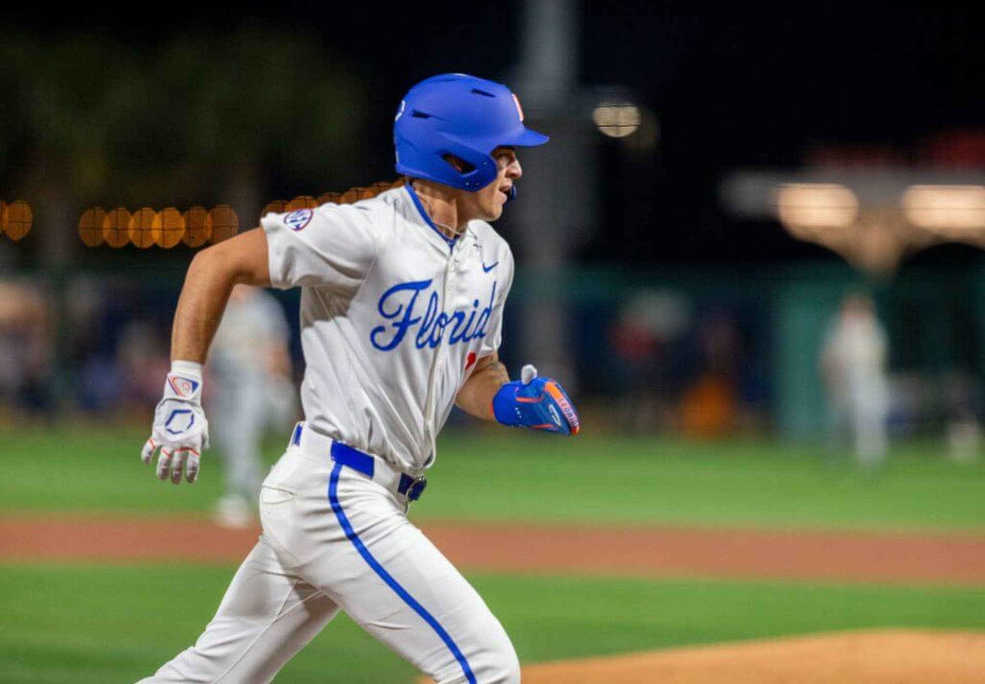 Kyle Jones scores a run for Florida.