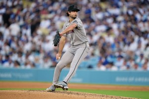 Mar 26, 2026; Los Angeles, California, USA; Arizona Diamondbacks starting pitcher Zac Gallen (23) throws a pitch against the Los Angeles Dodgers during the fifth inning at Dodger Stadium. Mandatory Credit: Kirby Lee-Imagn Images