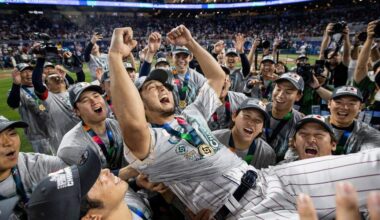 Japan pitcher Yu Darvish (11) celebrates with his teammates during an award ceremony after defeating the United States in the championship game at the World Baseball Classic at loanDepot Park on Tuesday, March 21, 2023, in Miami, Fla.