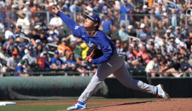 Los Angeles Dodgers pitcher Yoshinobu Yamamoto (18) throws against the San Francisco Giants in the first inning at Scottsdale Stadium.
