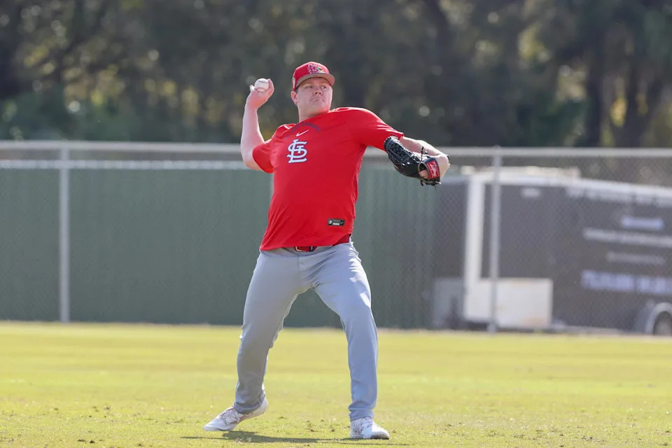 St. Louis Cardinals pitcher Richard Fitts (35) plays catch during spring training at Roger Dean Chevrolet Stadium. Sam Navarro-Imagn Images