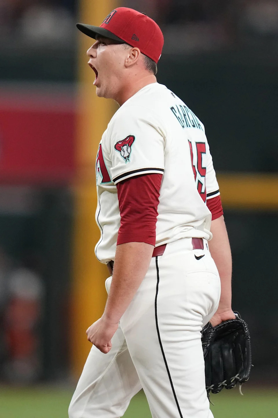 Arizona Diamondbacks left-hander Brandyn Garcia (55) celebrates his strikeout to end the 10th inning against the Los Angeles Dodgers at Chase Field in Phoenix, on Sept. 24, 2025.